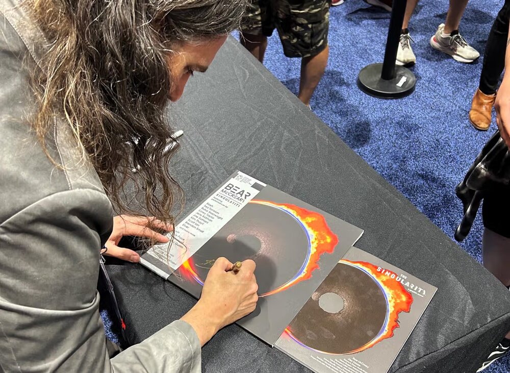 Bear McCreary signing copies of The Singularity album and graphic novel